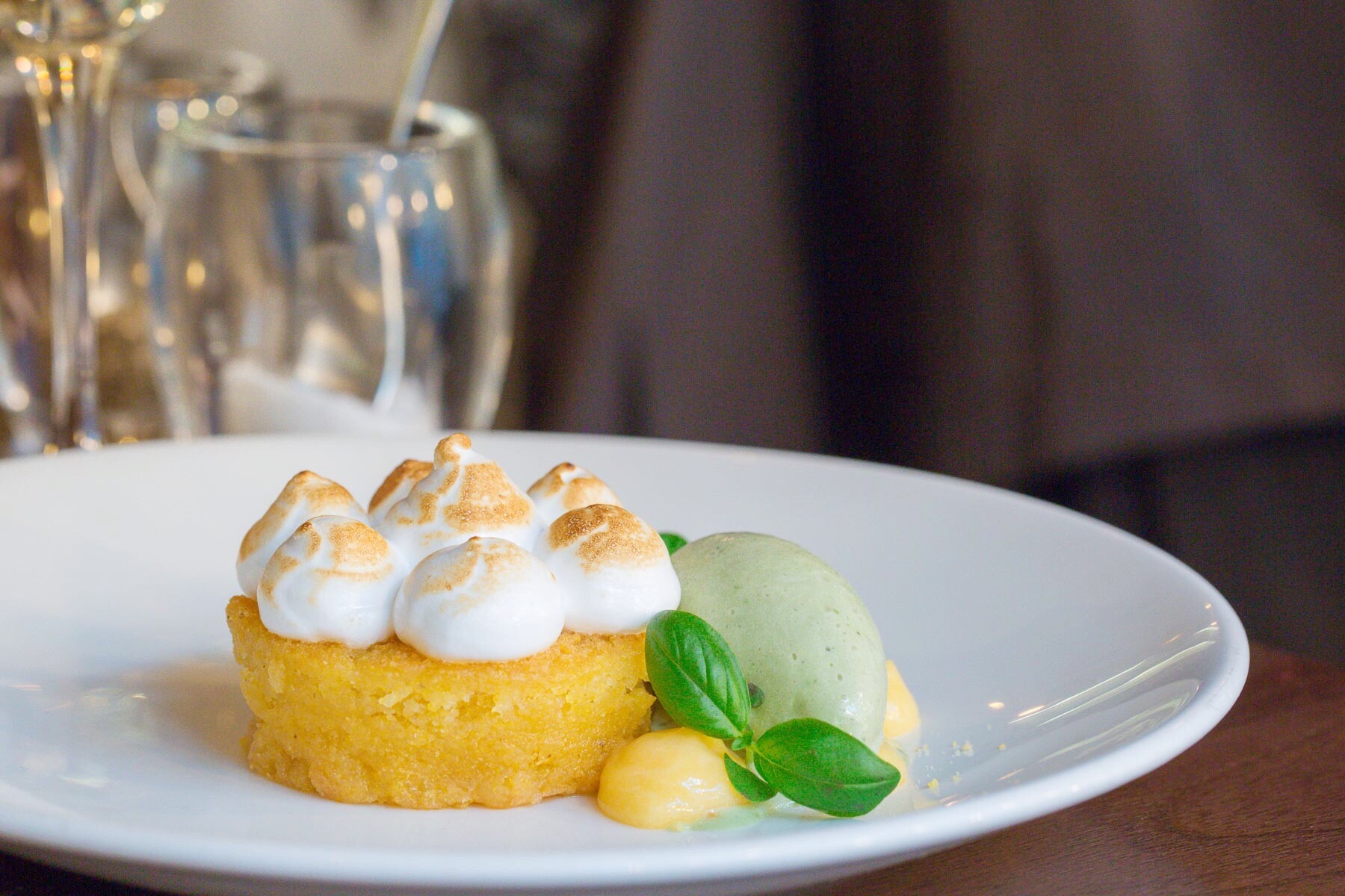 Lemon polenta cake with lemon curd, toasted meringue and basil ice cream at Wedgwood in Edinburgh